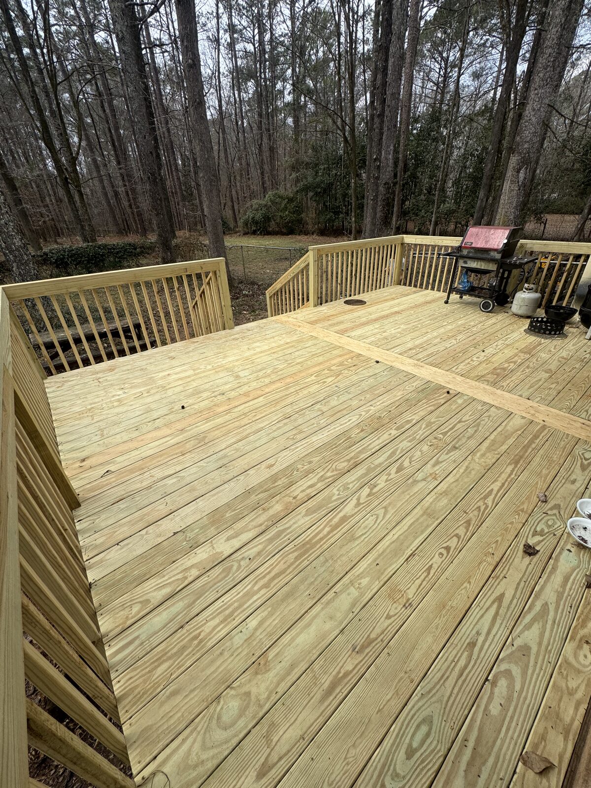 Brand new deck surface with full railing system