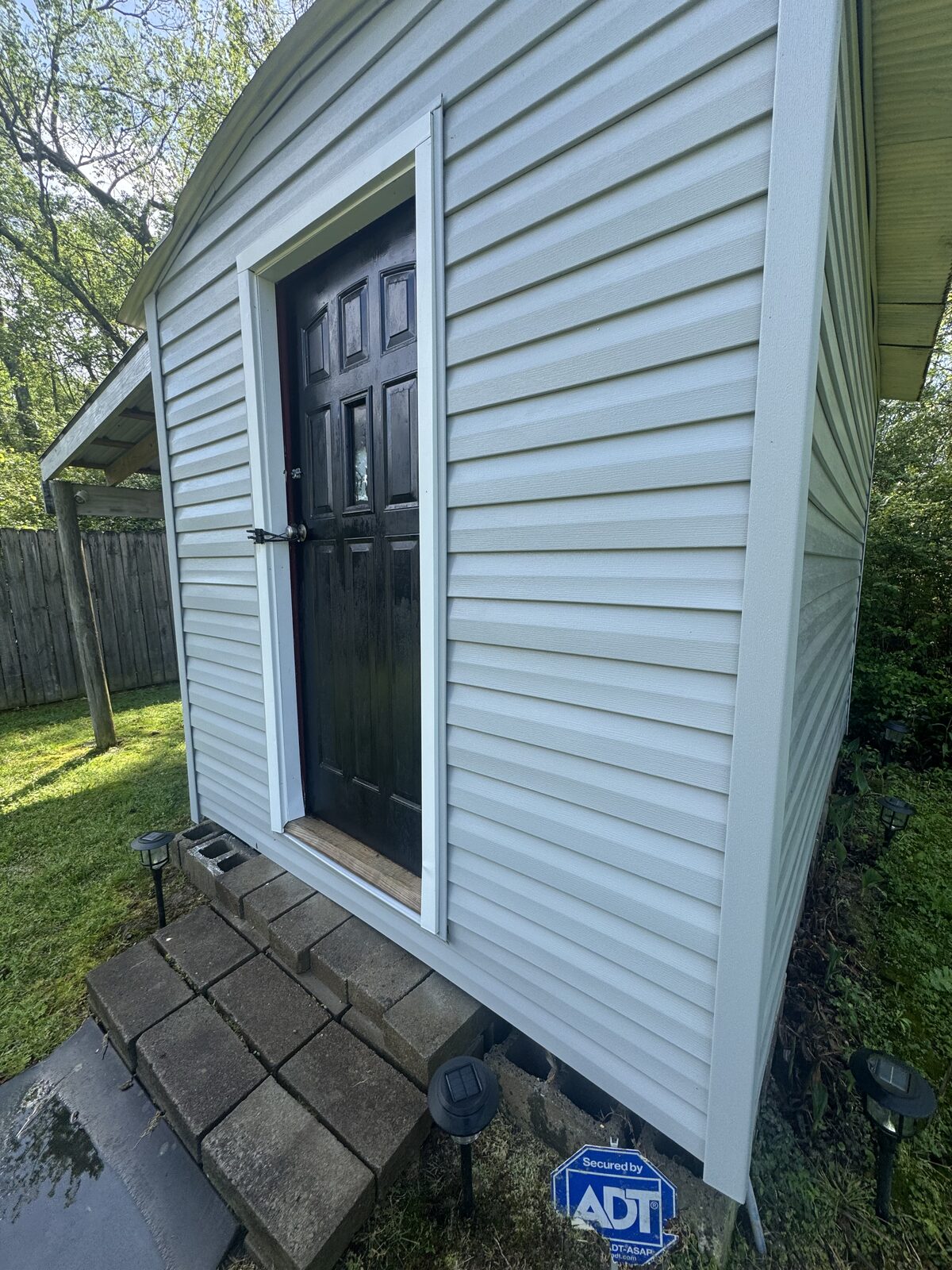 Outbuilding exterior cleaned and detailed