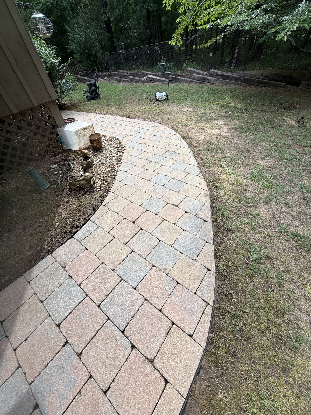 Curved brick paver walkway installation