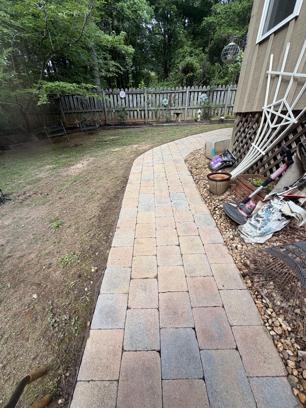 Custom paver path along home exterior